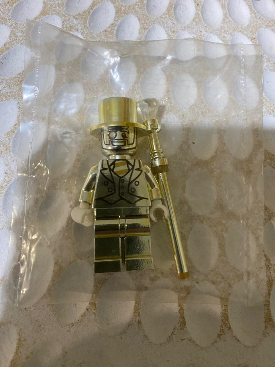 Lego Mr Gold minifigure with staff